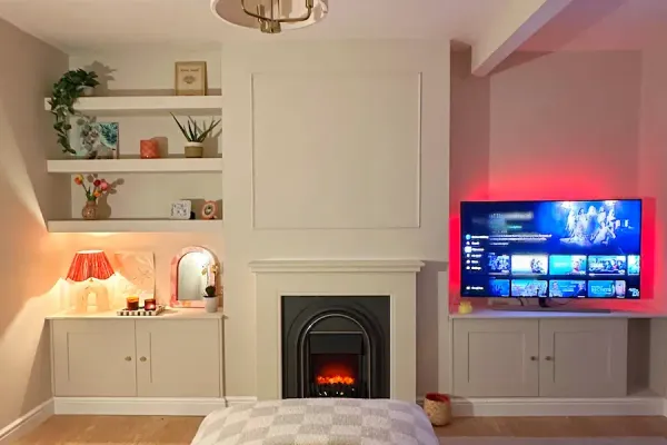 Alcove media wall with custom shelving built in Falkirk