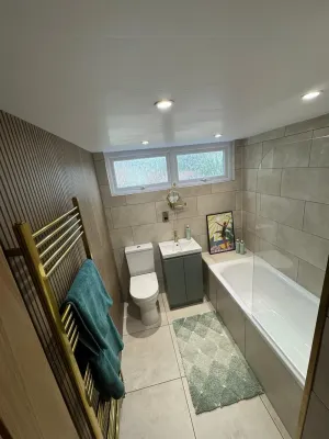 Bathroom installation during a multi-trade renovation in Falkirk