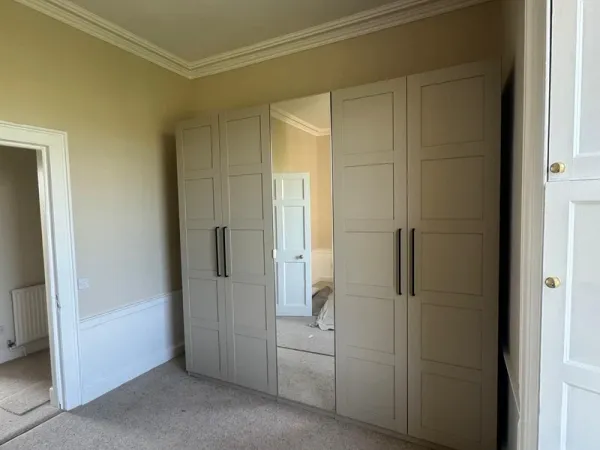 Bespoke fitted wardrobes with custom shelving installed in Falkirk