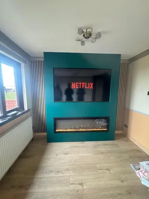 Media wall with electric fireplace and slat panels in Falkirk