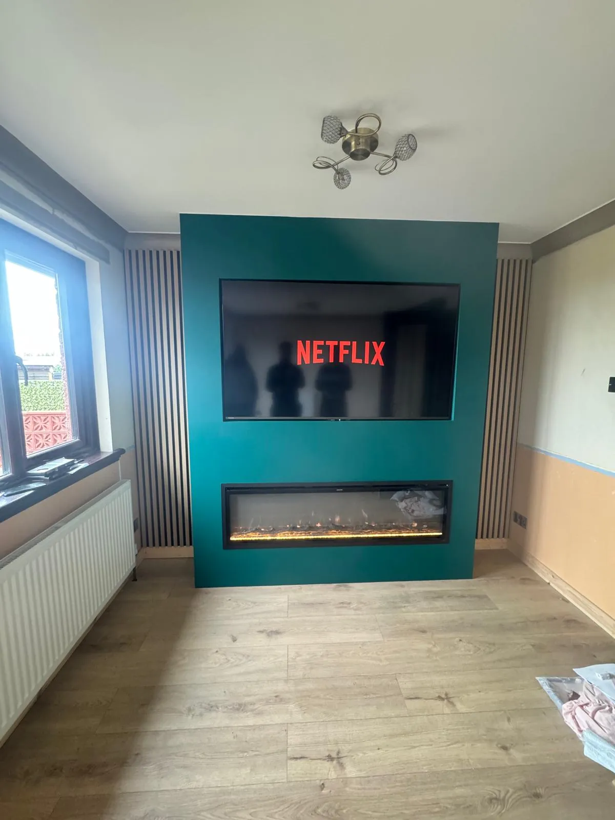 Slatted wall panelling and feature wall installed in a Falkirk home
