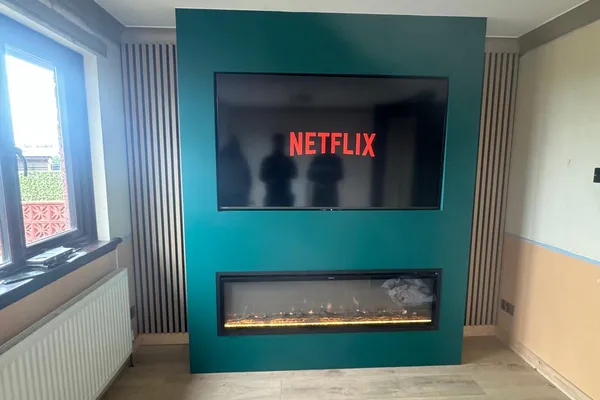 Media wall with electric fireplace and slat panels fitted in Falkirk