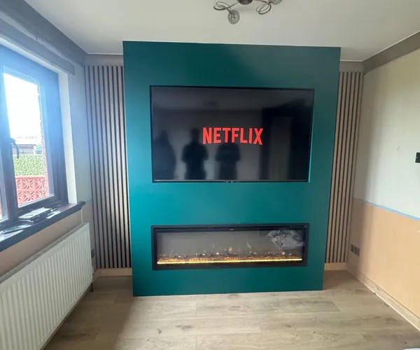 Slatted wall panelling with electric fireplace installed in Falkirk